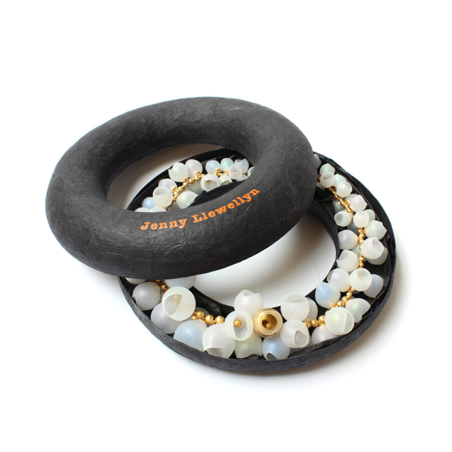 Who needs pearls silicone necklace in donut packaging box by Jenny Llewellyn