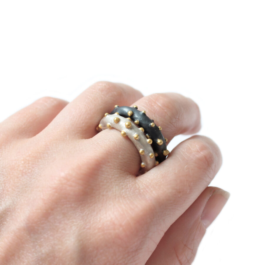 Corilia bobble rings worn