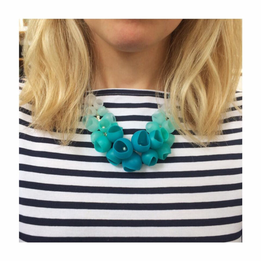 Sea green half cluster necklace worn