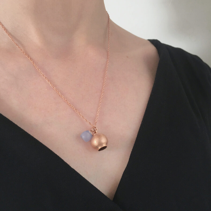 Rose gold plume pendant by Jenny Llewellyn