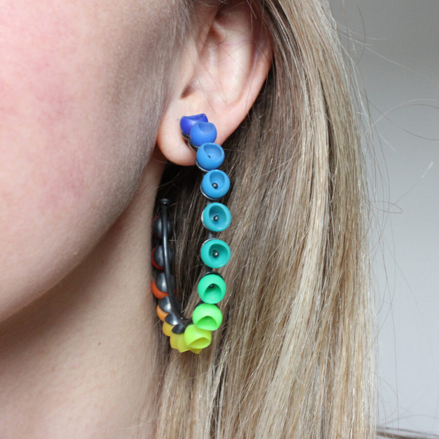 Large rainbow hoops worn - Jenny Llewellyn